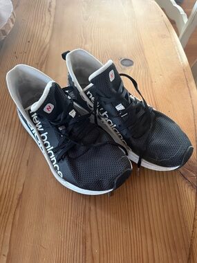 New Balance Black, White, and Leopard Athletic Running Shoes